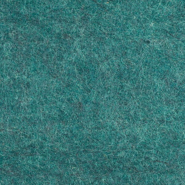 Close-Up View of a Dark Green Felt Texture, Highlighting Its Fibrous Details