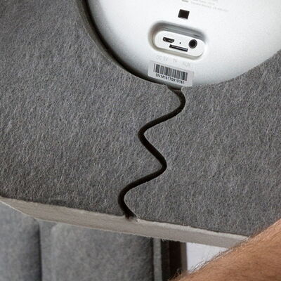 Felt Cover Attached to an Electronic Device with Visible Ports and Label