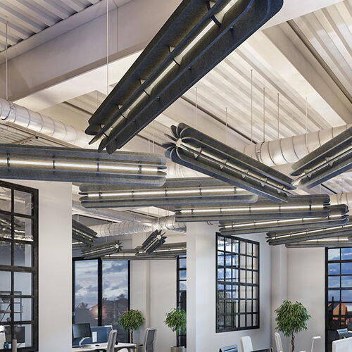Modern Office Space Featuring Exposed Metal Ventilation Pipes and Stylish Interior Design