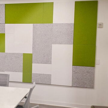 Colorful Wall Art in an Office Setting Featuring Green and Gray Panels