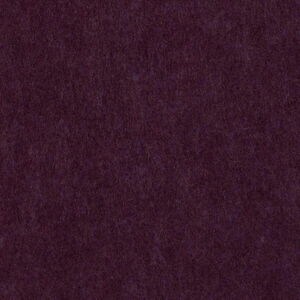 Close-Up of a Dark Textured Surface in Soft Lighting