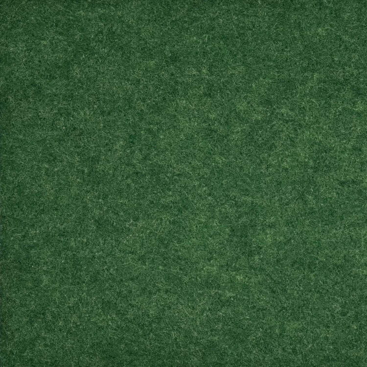 Close-up View of a Textured Green Felt Surface